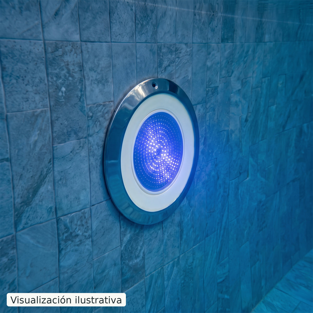 Visualización ilustrativa. Detalle de la lámpara RGB DLX-9-C-18W-12A en una pared sumergida, mostrando un ajuste azul. Ejemplo de aplicación; no representa una medición de cobertura o intensidad.